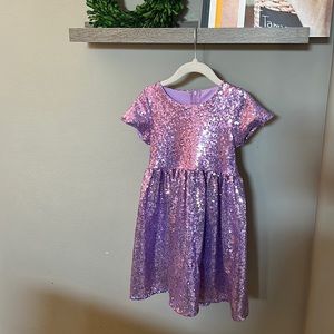 Little girl shimmery, sequence, fun fashion dress.
